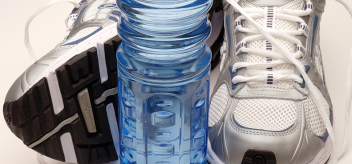 athletic shoes with water bottle