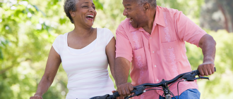 older couple riding bicycles