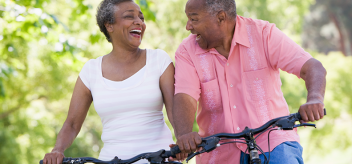 older couple riding bicycles