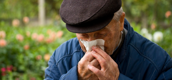 elderly man coughing