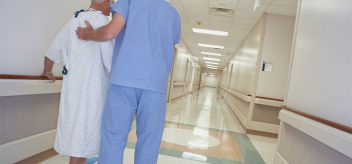patient walking through hospital