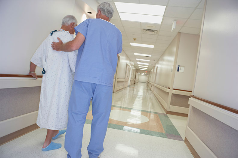 patient walking through hospital