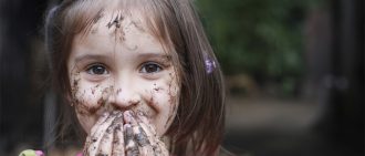 girl covered in dirt