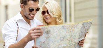 couple holding map