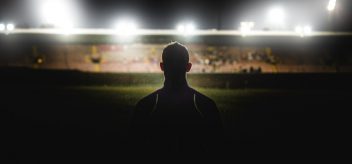 Night game with athlete in silhouette