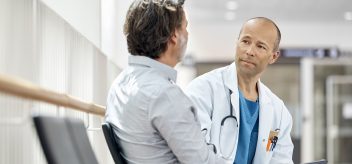 Doctor Counseling Male Patient