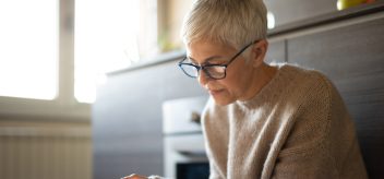 older woman on tablet