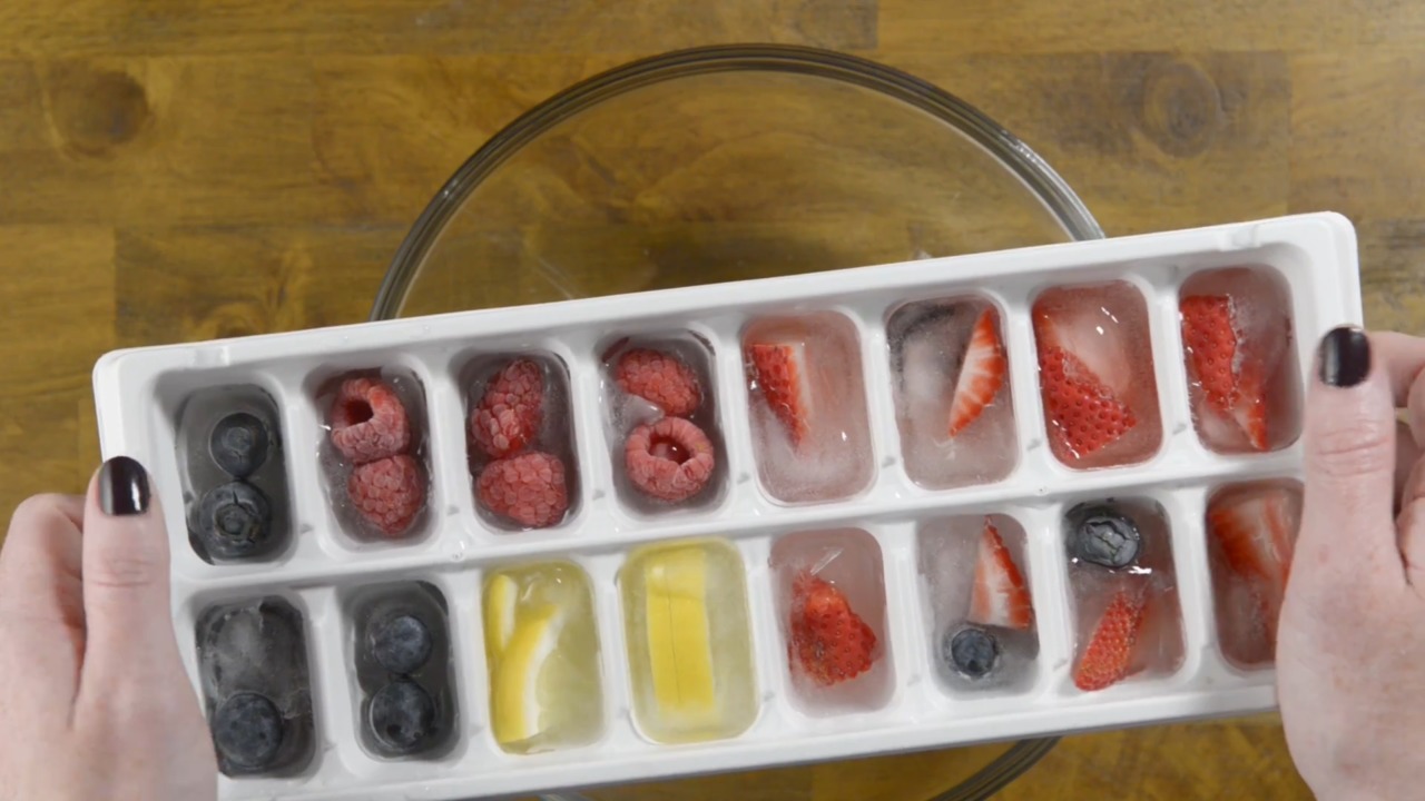 Add a little guilt-free flavor to your favorite drinks with this easy and healthy recipe: fruit-infused ice cubes.