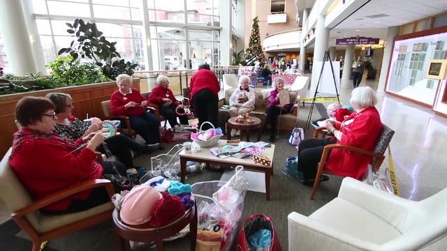 Dena Chottiner, founder of Magee-Womens Hospital of UPMC's Volunteer Knitter initiative, and others explain the program knitting caps for chemotherapy and newborns. They ensure that 'no hat goes headless' under their watch!